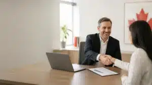 Employer and candidate reviewing a genuine job offer for Express Entry